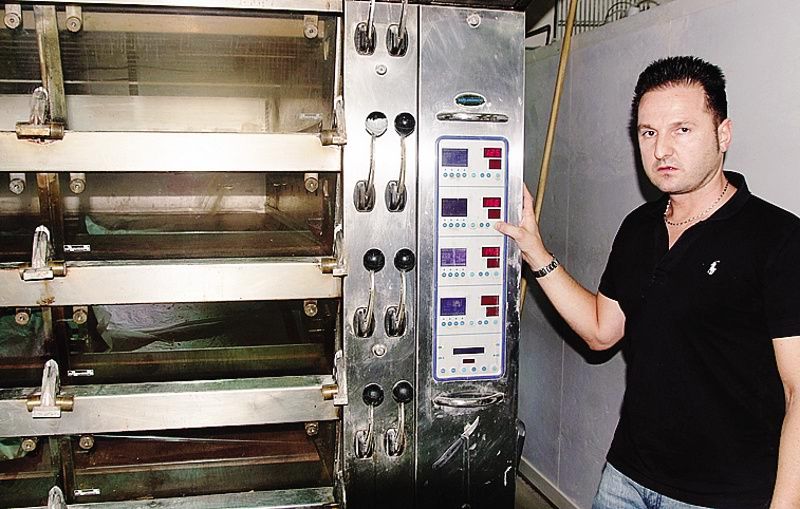 Fausto Moreschi all’interno del suo laboratorio<span class=